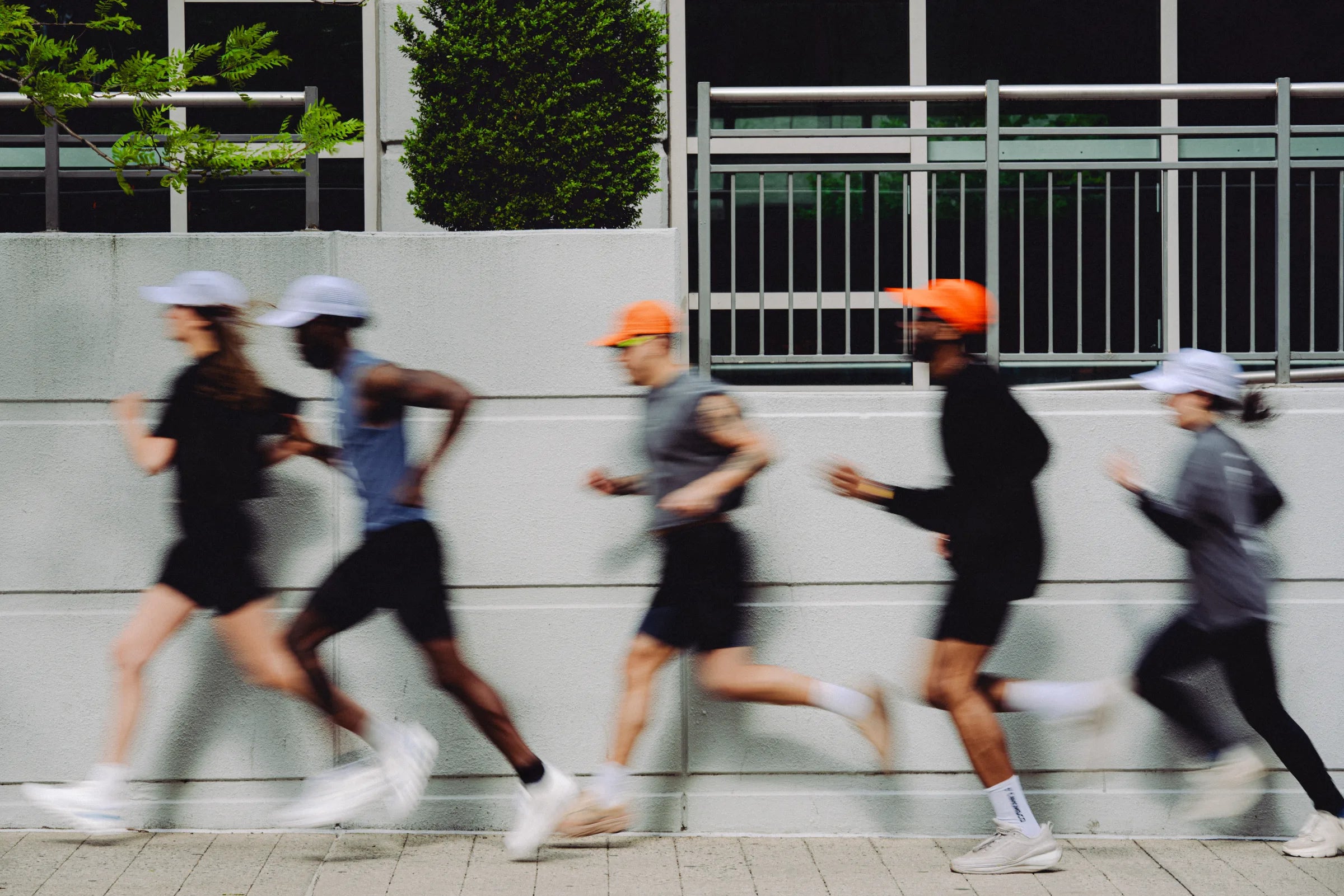 Cañon Running club members running through Jersey City at sunrise